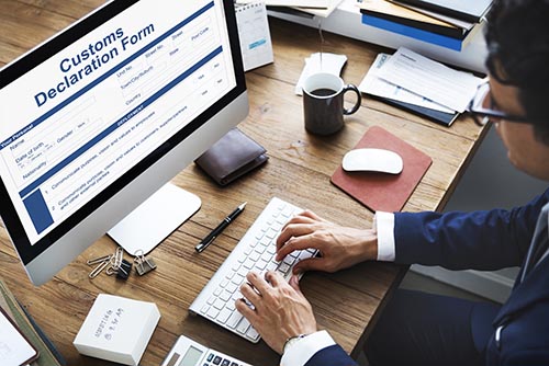 Customs specialists handling import/export documentation and compliance